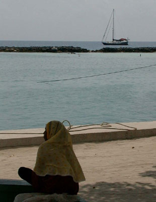 Nanou anchored off of woman